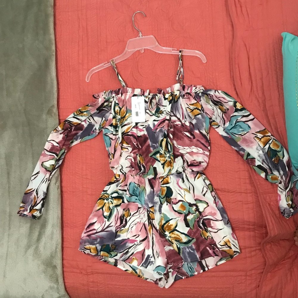 Floral printed Romper size small 2/4